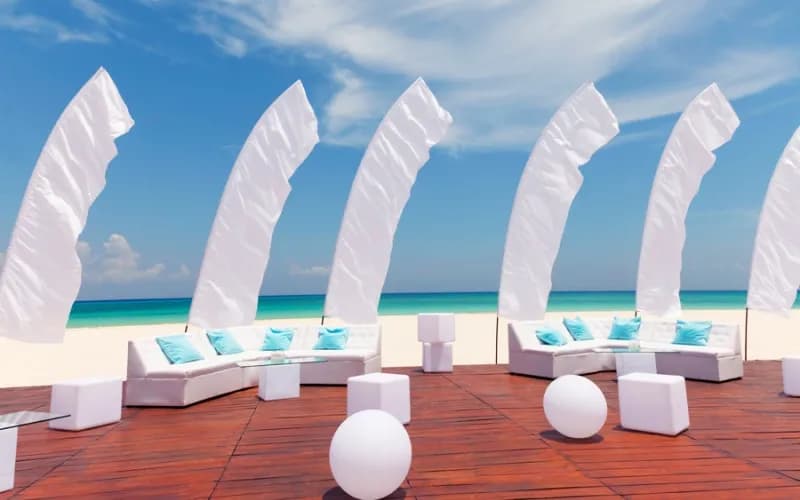 A sundeck with chairs and flags at Playacar Palace. A sundeck with chairs and flags at Playacar Palace.