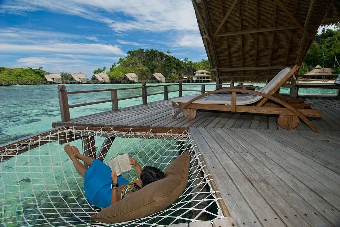 An overwater hammock at Misool Resort An overwater hammock at Misool Resort