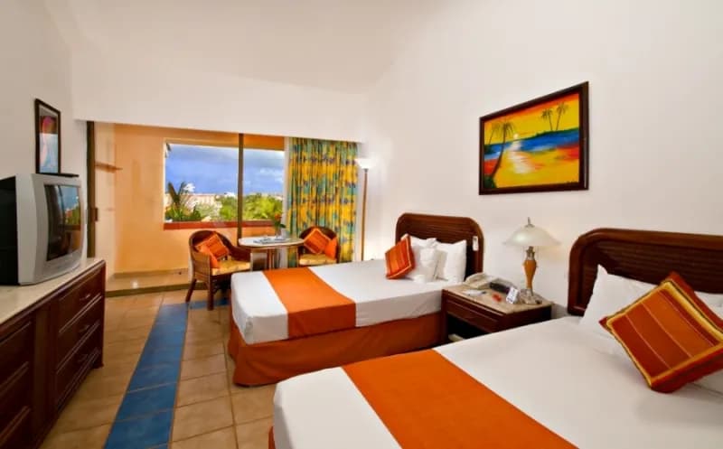 Two beds in a tastefully decorated hotel room. Two beds in a tastefully decorated hotel room.