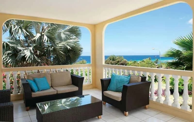 Sofa and chairs on a standard villa balcony at Livingstone Jan Thiel Beach Resort Sofa and chairs on a standard villa balcony at Livingstone Jan Thiel Beach Resort