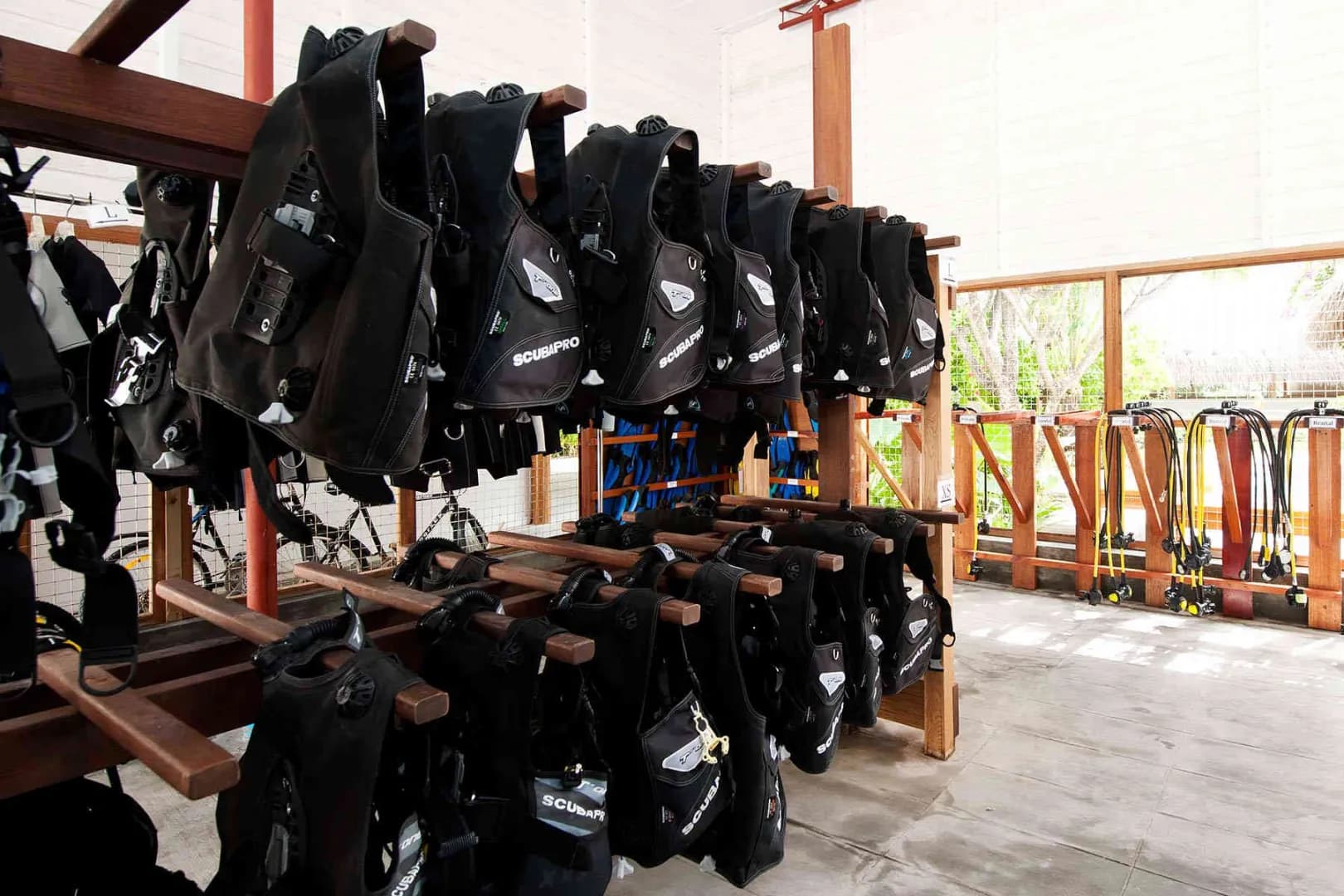 Scuba diving equipment hangs at Kuramathi Island Resort Maldives. Scuba diving equipment hangs at Kuramathi Island Resort Maldives.