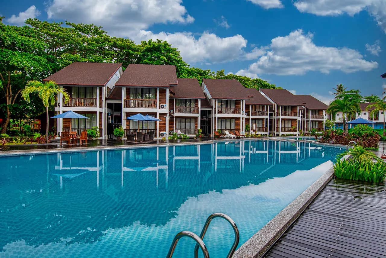 Swimming pool with the accommodations in the background Swimming pool with the accommodations in the background