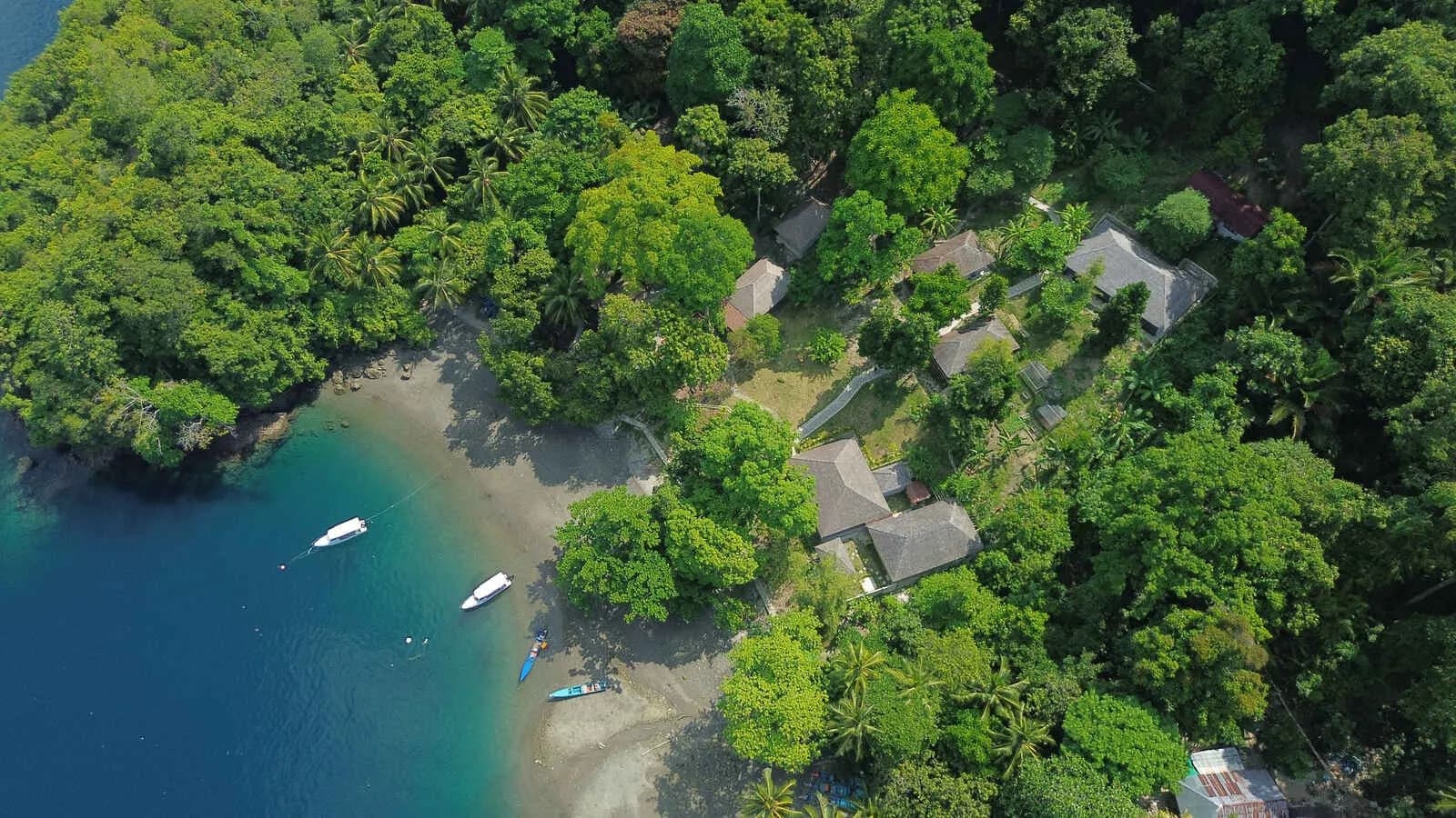 Aerial view of Ambon Dive Resort with their boat Aerial view of Ambon Dive Resort with their boat