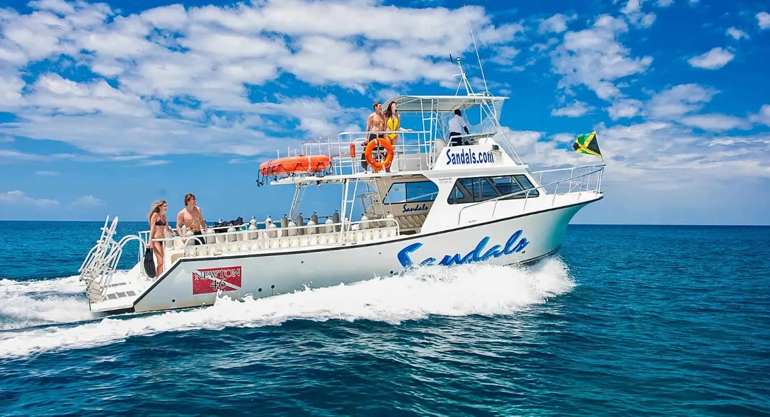 A Sandals dive boat sailing across the ocean A Sandals dive boat sailing across the ocean