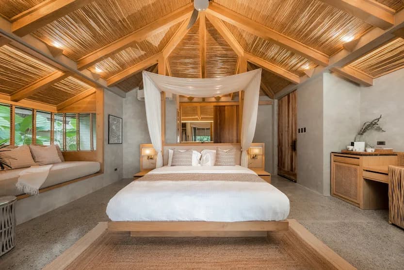 The large bed of the Deluxe Villa at Manami Resort, Philippines The large bed of the Deluxe Villa at Manami Resort, Philippines