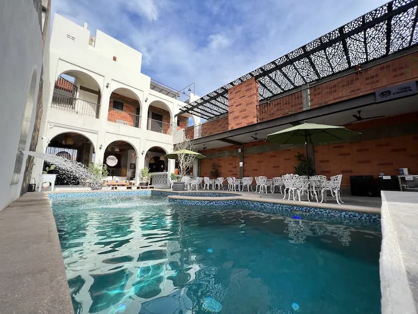 Swimming pool with building facade in the backgroun Swimming pool with building facade in the backgroun