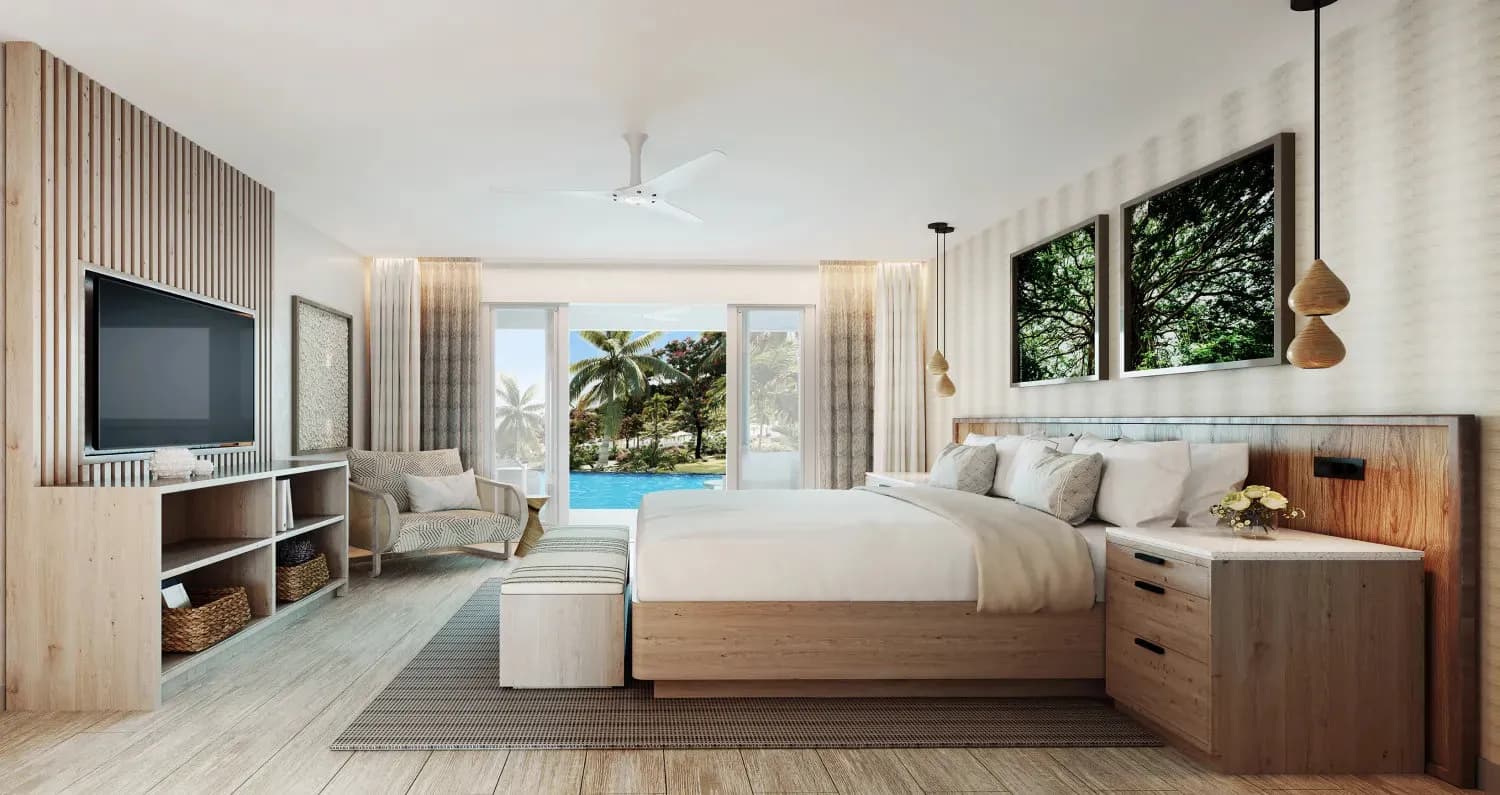 Large bed and TV of the Swim-up Suite Large bed and TV of the Swim-up Suite