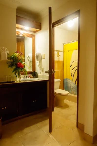 Bathroom in a deluxe oceanview room at Manta Ray Bay Resort in Yap, Micronesia. Bathroom in a deluxe oceanview room at Manta Ray Bay Resort in Yap, Micronesia.