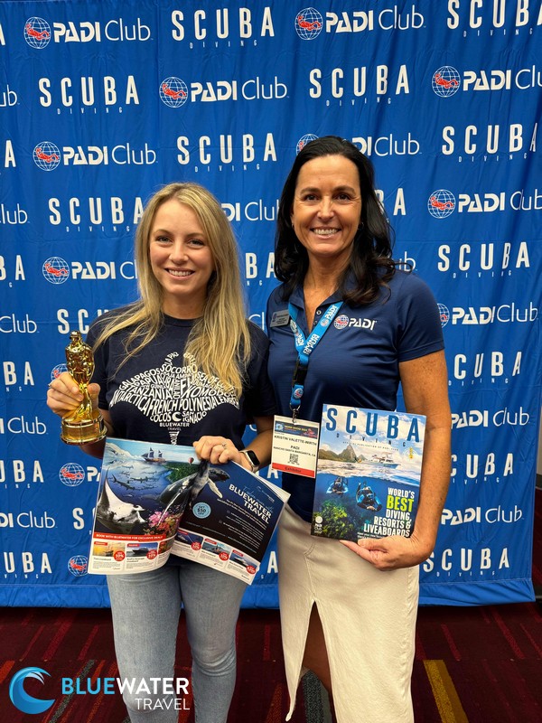 Bluewater Travel accepts an award for one of the Best Dive Travel Agencies from PADI's Scuba Diving Magazine