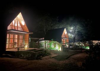 Moko Alor Villas lit up at night