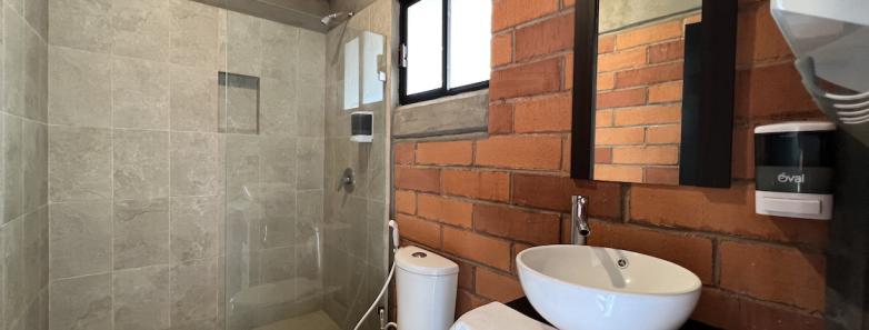 Ensuite bathroom complete with a toilet and shower