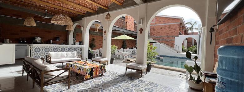 Buceo Carey lobby with couches and tables for guests