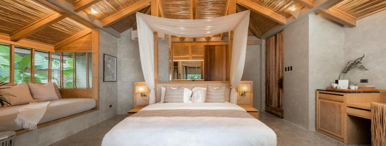 The large bed of the Deluxe Villa at Manami Resort, Philippines