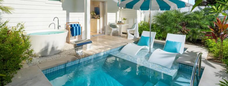 Suite with private pool and lounge chairs