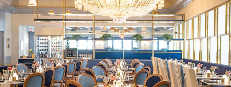 Tables and chairs set up in the dining area