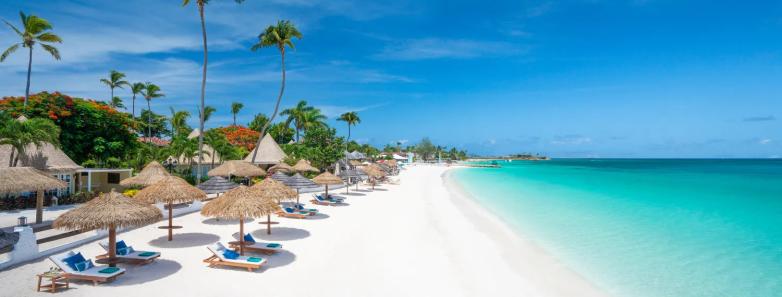 Sandals beachfront with lots of sunbeds and umbrellas