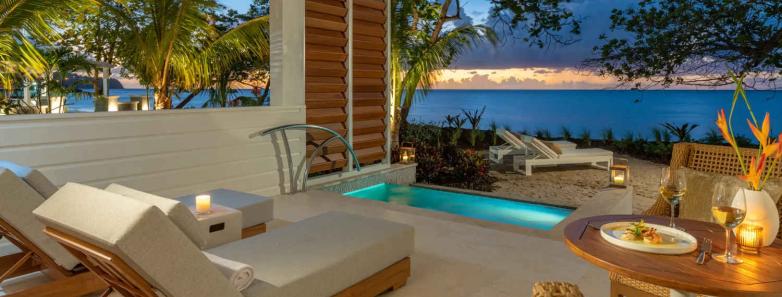 Lounge chair with pool in the background