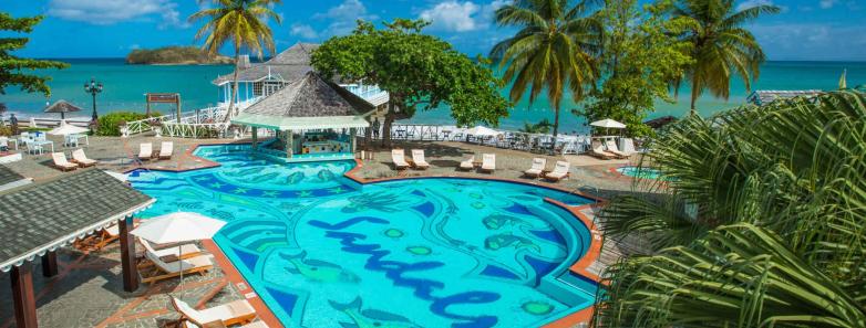 Swimming pool surrounded by chairs