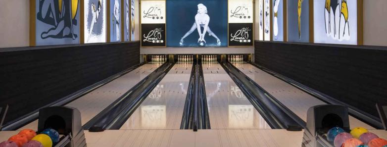 Bowling alley with paintings on the side