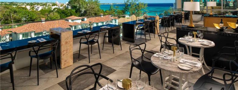 Tables and chairs set up for Sandals guests