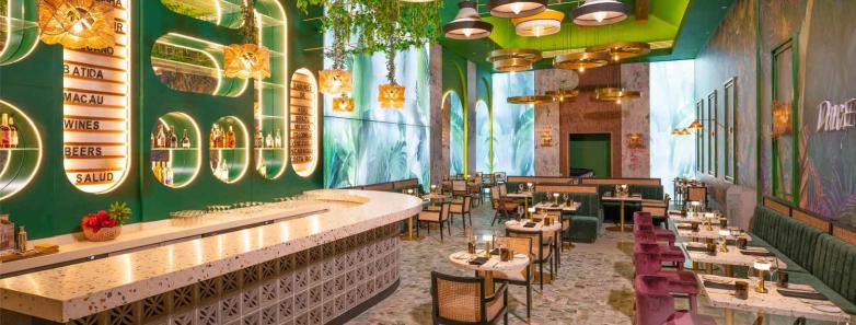 Dining area with green tiles set up for guests