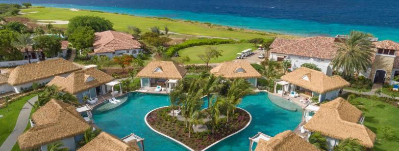 The Sandals Poolside Bungalows encircling a heart-shaped pool