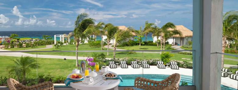 Breakfast set up on the patio of the One-Bedroom Suite