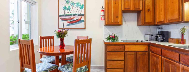 Dining area and kitchen of the Pool View Suite