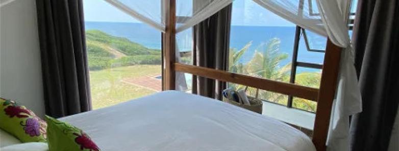 A Villa Martino bedroom on the second floor overlooking the sea