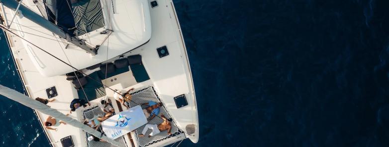 Guests lounging on the deck of the Walkout Liveaboard