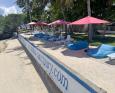 Cabilao Sanctuary's beachfront with bean bags and sunbeds